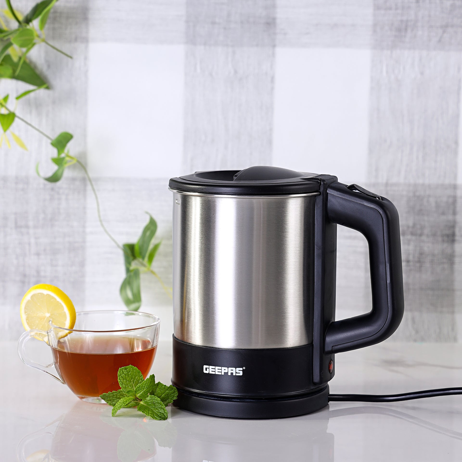 Geepas Travel Electric Kettle | Stainless Steel Housing, Boil-Dry & Overheat Protection | Heats Up Quickly & Easily| Boiler For Hot Water, Tea & Coffee | 1.0L, Cord Storage |1200W | 2 Year Warranty