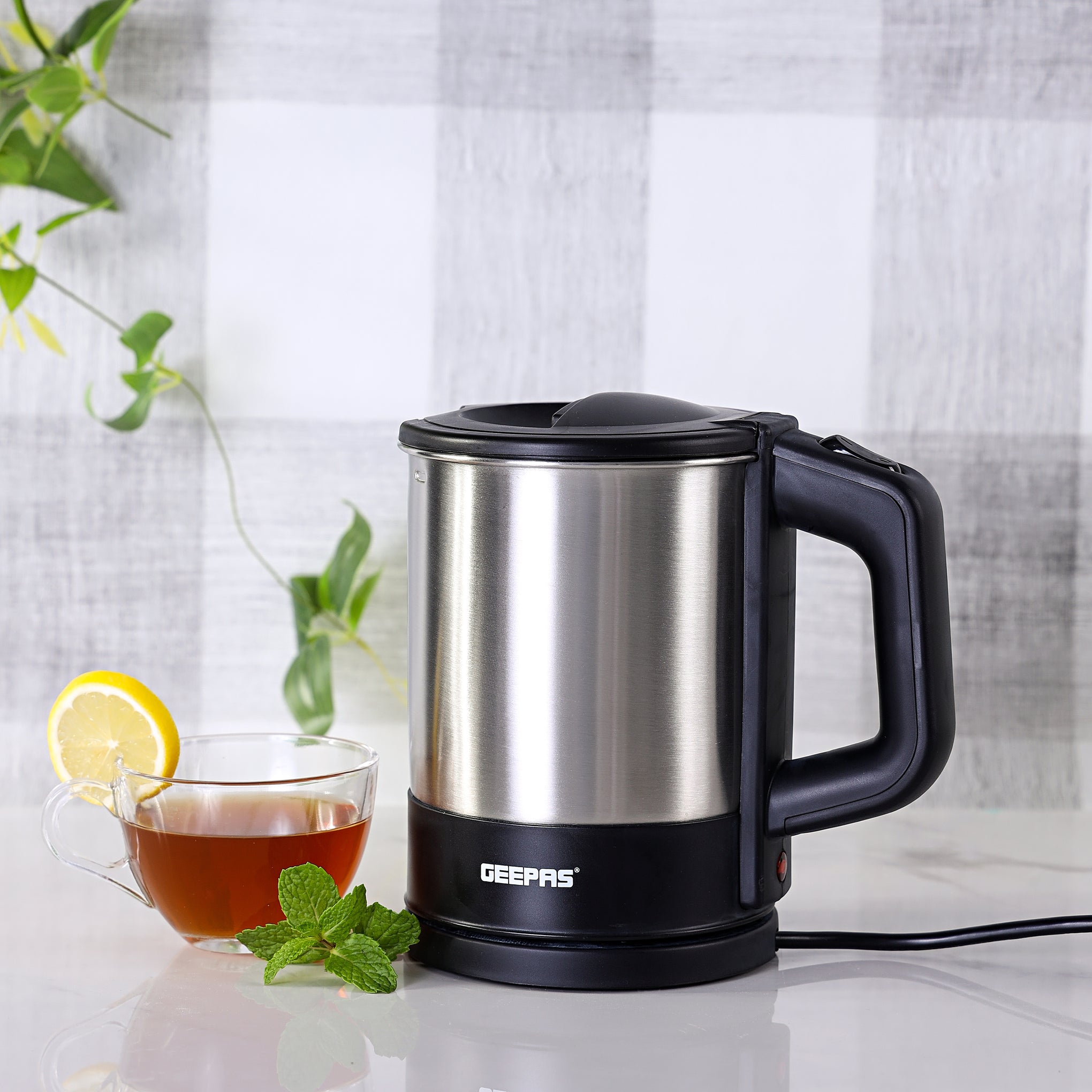Geepas Travel Electric Kettle | Stainless Steel Housing, Boil-Dry & Overheat Protection | Heats Up Quickly & Easily| Boiler For Hot Water, Tea & Coffee | 1.0L, Cord Storage |1200W | 2 Year Warranty