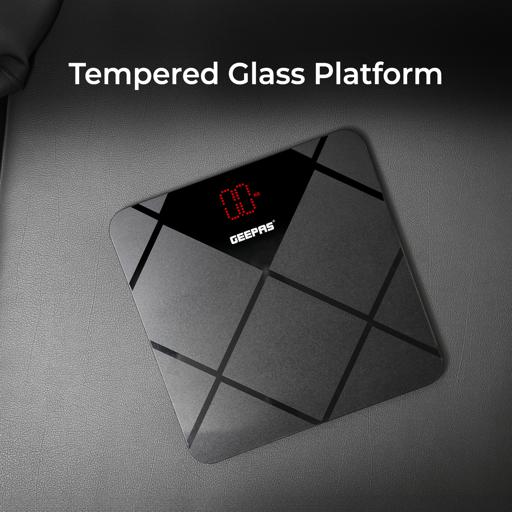 Geepas Digital Body Scale With Digital Display, Max Weight 180 Kgs, 6 MM Tempered Glass, Anti-Slip Design, Red Lattice LED, Auto On-Off, High Precision Strain Gauge Sensor GBS46523UK Grey & black