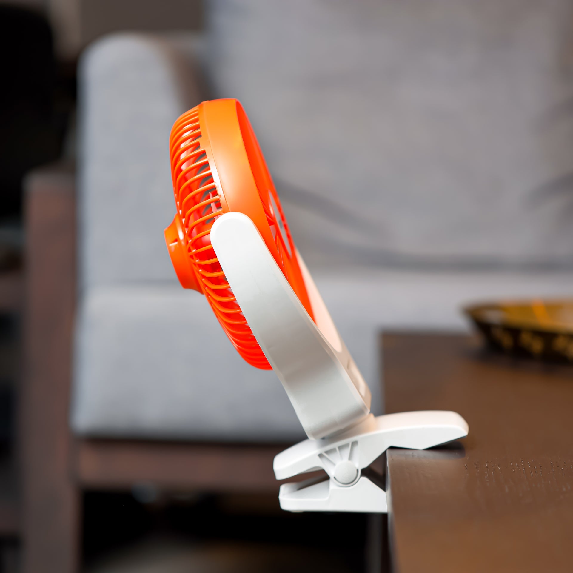 8 Inch Multi Angle LED Clip Fan, 9 Hours Working Time, AC/DC Function, 1500 mAh Lithium Battery, Two Level LED, Up/Down Tilting, Charging Indicator, Full Charged Indicator, Working Indicator GF21121 Orange & white