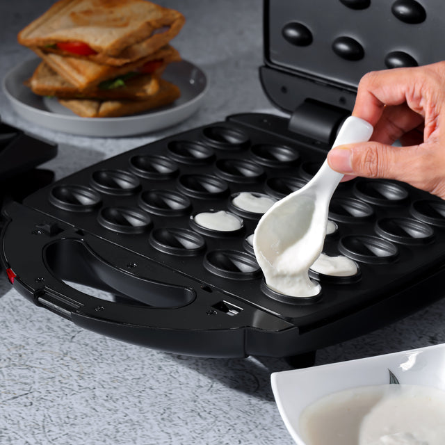 Geepas 6 in 1 Multi Snacks Maker- GSM36528| Sandwich Maker, Grill| Waffle Maker, Samosa Maker, Donut Maker, Nut Plate| Non-Stick| 1400W| Detachable Multi-Plate| Black and Silver| 2 Year Warranty